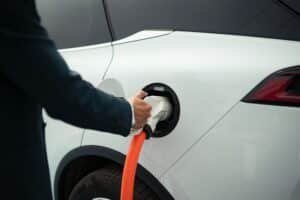 close-up photo of electric vehicle charging